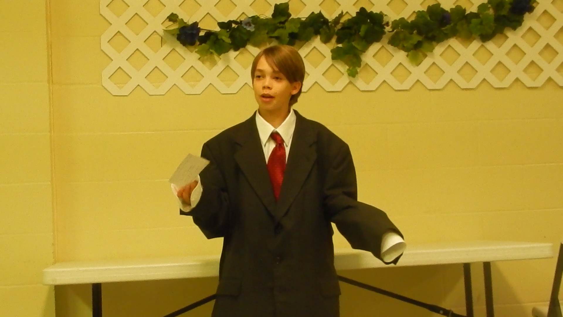 Student presenting in dramatic flair - homeschooldrama.com