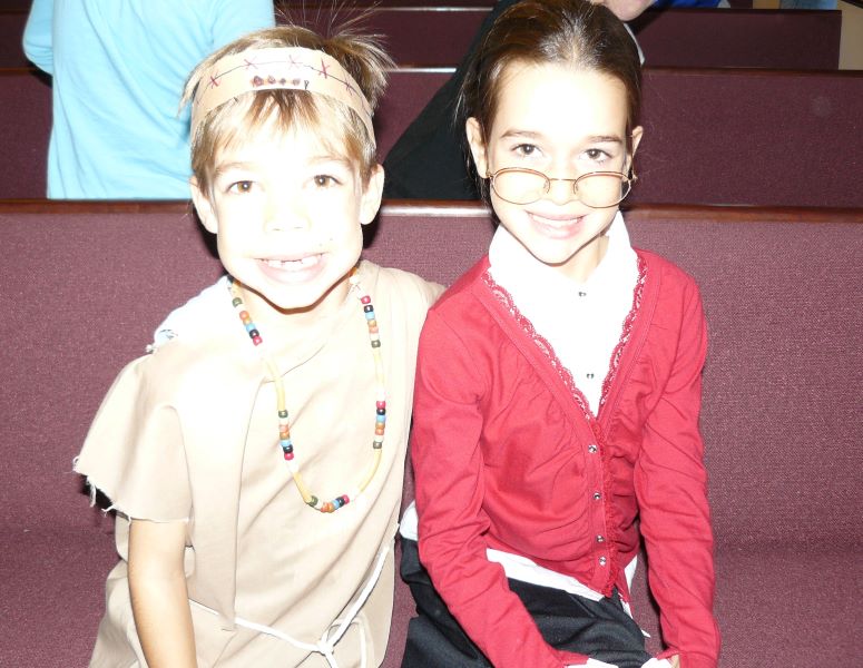 Students dressed up to perform a Thanksgiving play - homeschooldrama.com